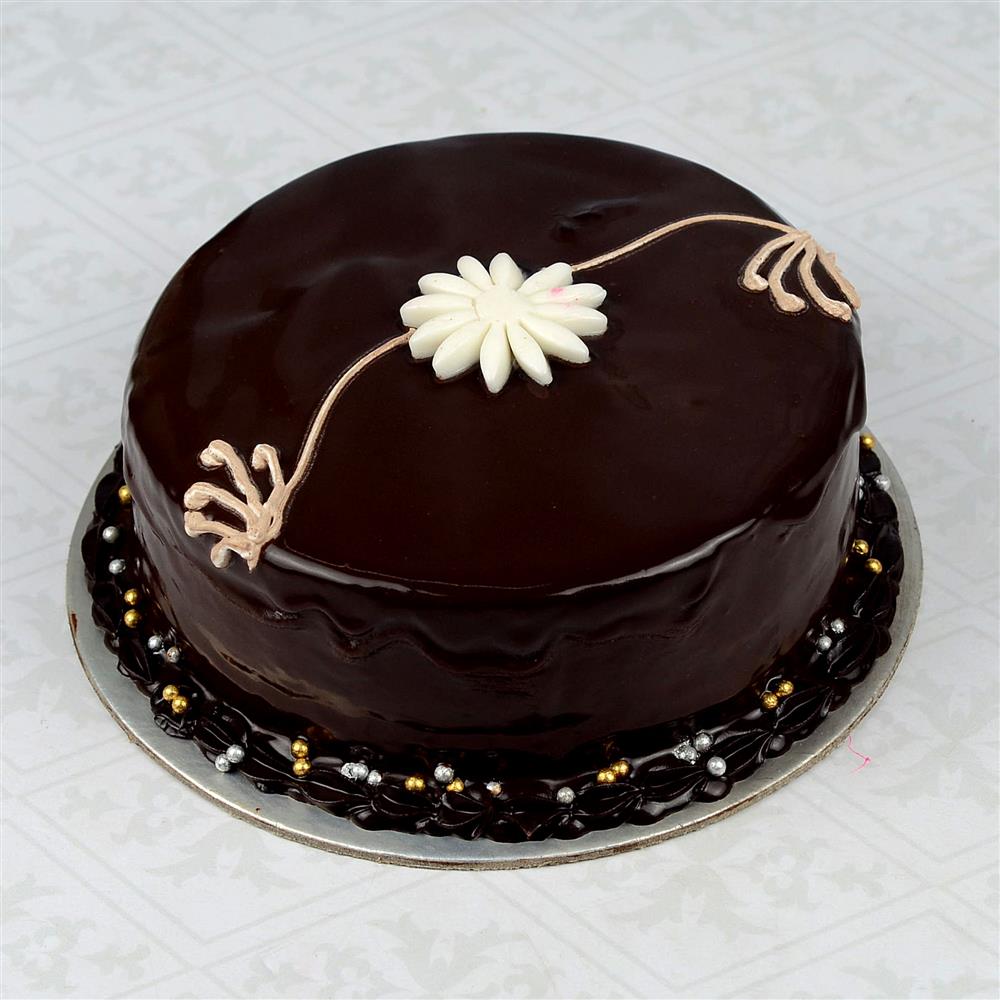 Dutch Chocolate Happy Rakhi Cake with Rakhi | Giftsmyntra.com