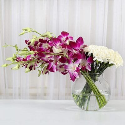 Orchids and Carnation in a bowl