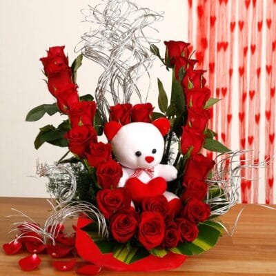 Beautiful  arrangement with teddy bear
