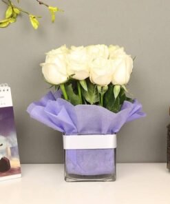 White Roses In A Square Vase